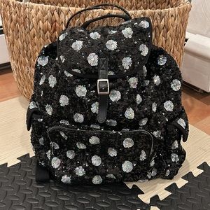 RUUM silver and black polkadot Sequence backpack with lots of pockets